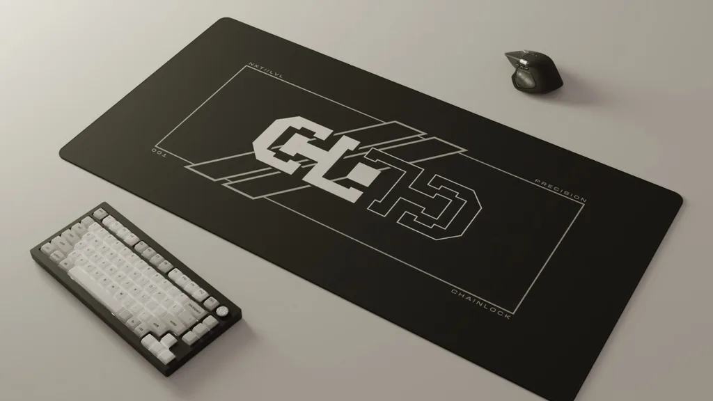 The Chainlock design on a desk mat, with a keyboard and mouse.
